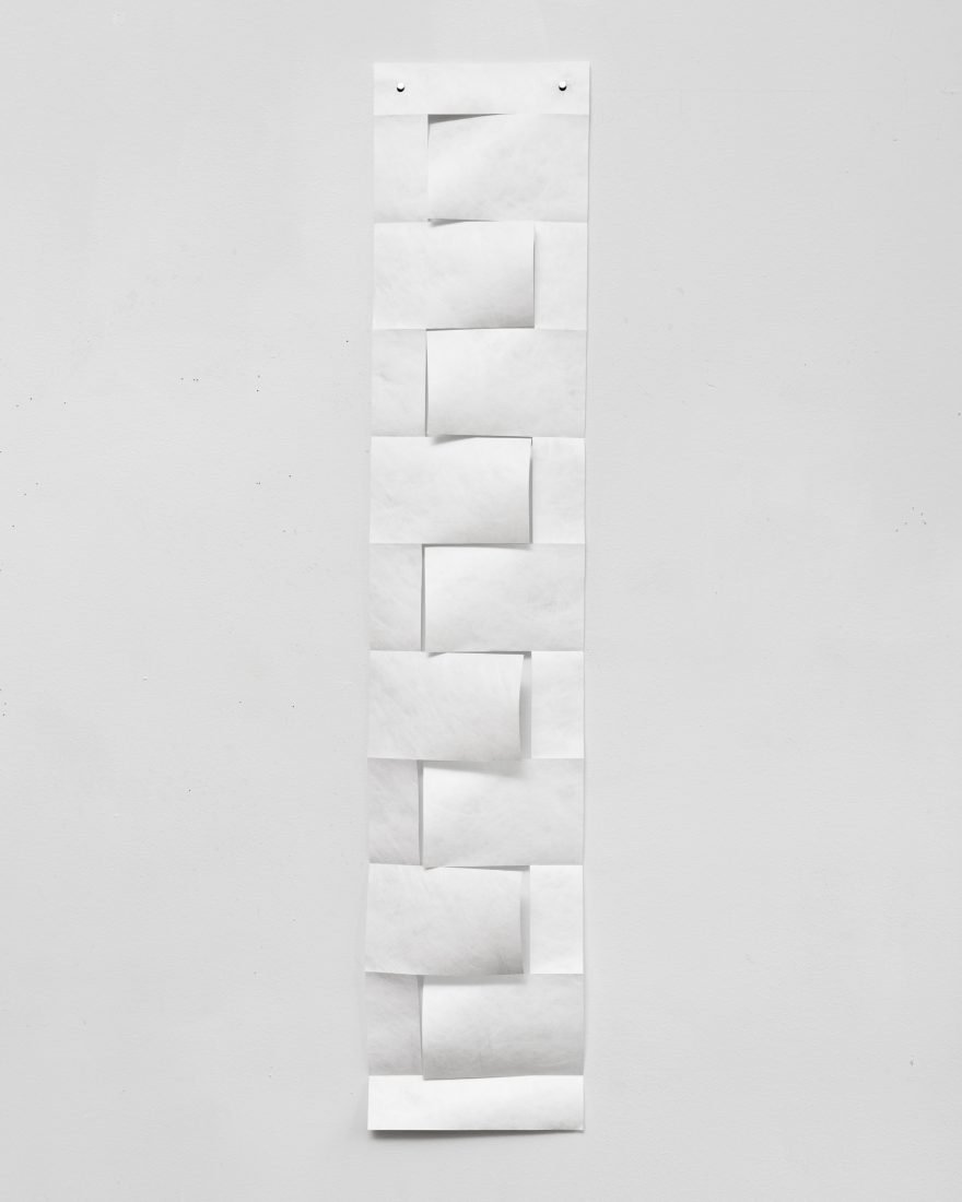 A drawing made by cutting and folding Tyvek. Artist: Daniel G. Hill